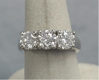 3 stone diamond ring with equal size diamonds